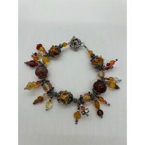 Artisan Lampwork Glass Bracelet With Amber Gold Swirl and Faceted Beads
